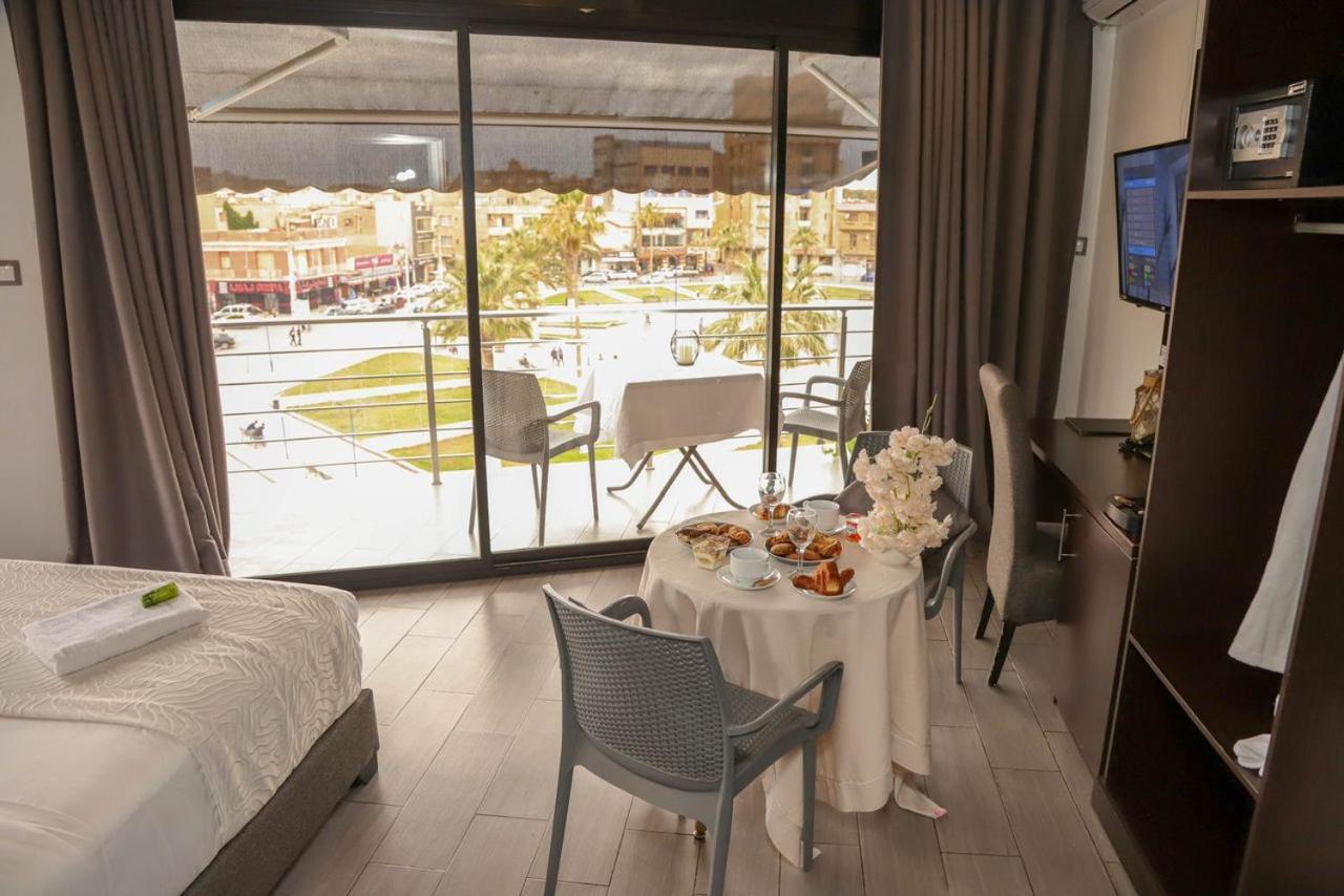 Calypso Hotel Ain el Turk Bagian luar foto